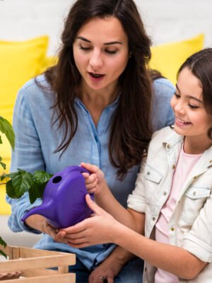 mother-daughter-watering-plant mother-daughter-watering-plant
